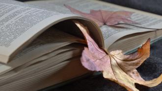 book and maple leaf